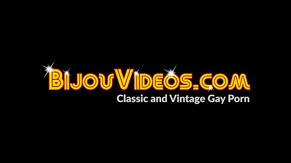 Hunks are stroking their cocks together in vintage video
